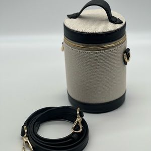 Black and Tan Paravel Crossbody Capsule Purse with Gold Details